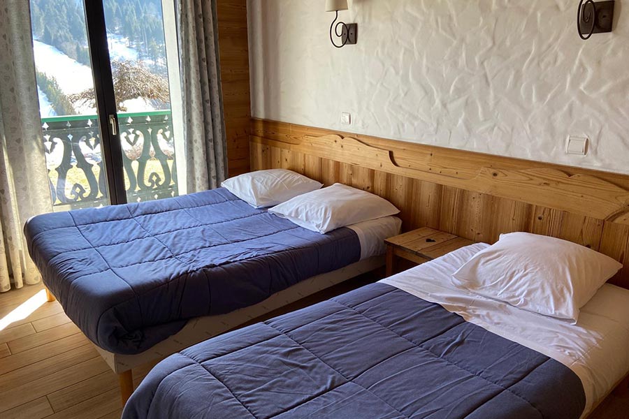 Chambre triple, lit double et lit simple